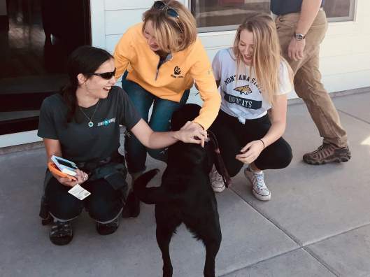 Leesa and her daughter are crouching with me. Jenny has just surprised me with a HUGE kiss!